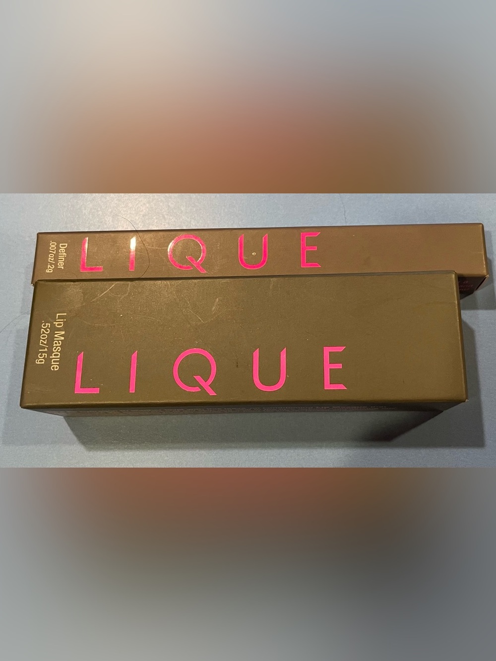 Lique lip masque in Blushing and Liquue Definer in Scandal.